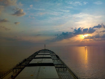 Scenic view of sea against sky during sunset on bulk carrier vessel