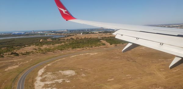 Airplane flying over land