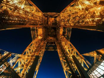 Low angle view of illuminated bridge