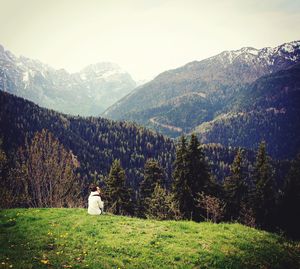 Rear view of woman looking at mountain