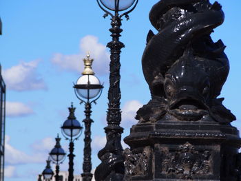 Low angle view of statue against sky