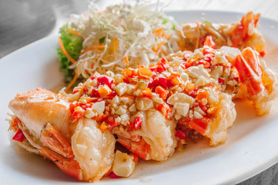 Close-up of served food in plate