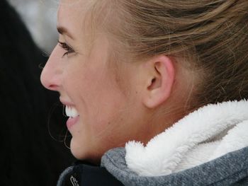 Close-up of a young woman with eyes closed