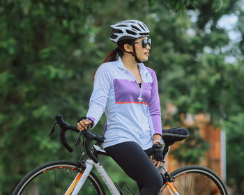 Portrait of woman riding bicycle