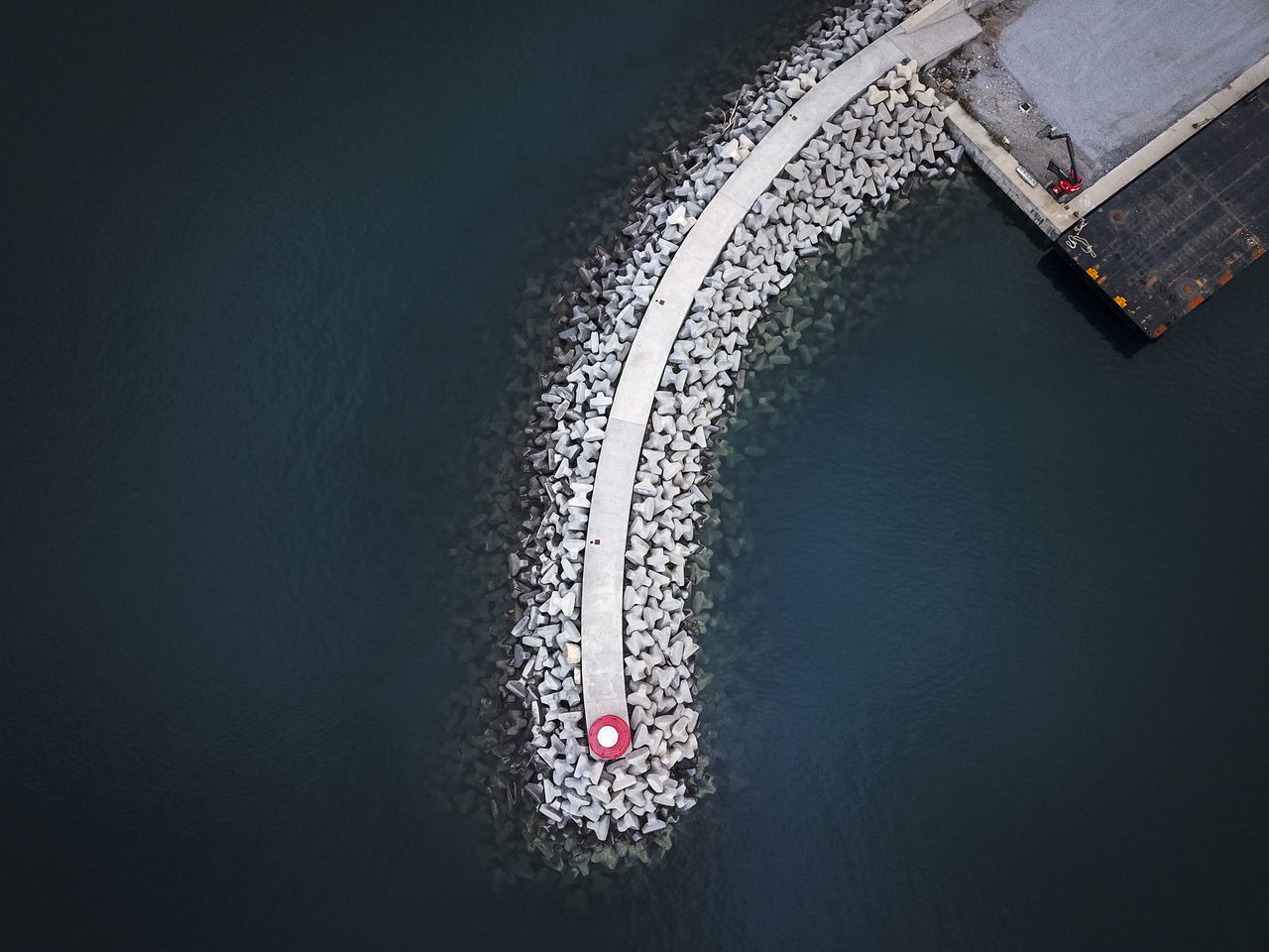 HIGH ANGLE VIEW OF ILLUMINATED BOAT ON LAKE