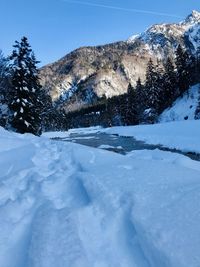 Snow covered mountain against sky