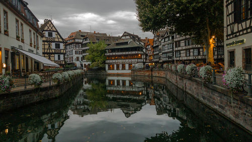 Maison des tanneurs, half timbered-house petite france district with water reflection 