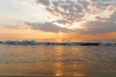 Scenic view of sea against sky during sunset