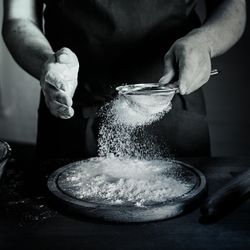 Midsection of man washing hands