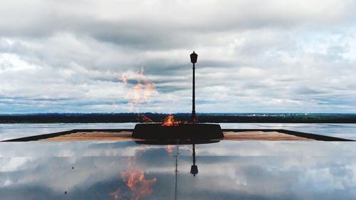 Scenic view of fire against sky