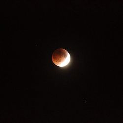 Low angle view of moon in sky