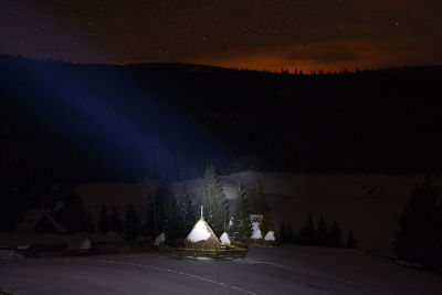 Illuminated road at night