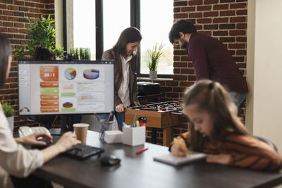 Business colleagues working at office