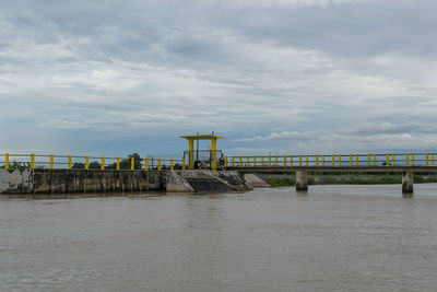 Pier over sea against sky