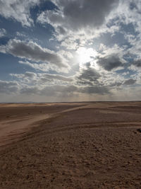 Scenic view of desert against sky
