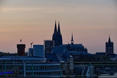 Cologne dome against sky at sunset