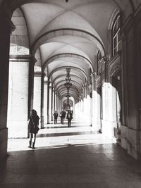 People walking in tunnel