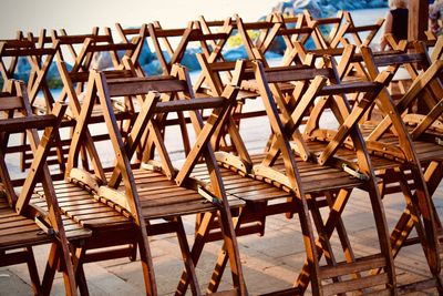 Wooden chairs in front of a restaurant on beach