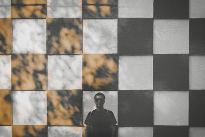 High angle view of shadows standing on floor