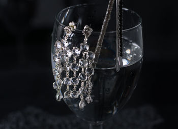 Close-up of glass against black background