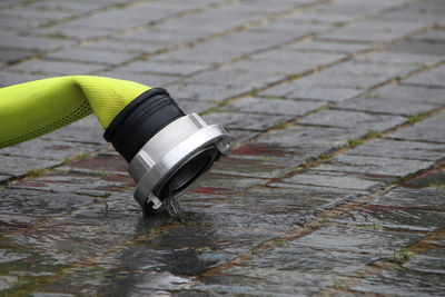 High angle view of electric lamp on footpath