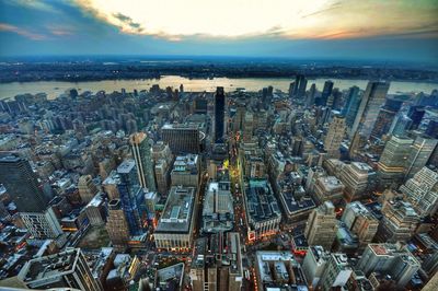 High angle view of modern buildings in city against sky