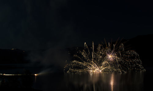Firework display at night