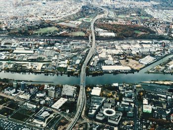 High angle view of road amidst buildings in city