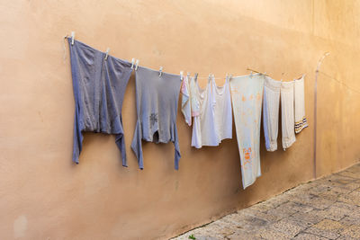 High angle view of clothes hanging on wall