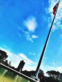 Low angle view of buildings against blue sky