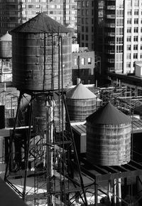 High angle view of silos against built structures