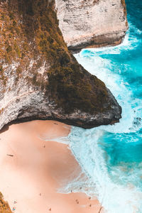 High angle view of rock formation in sea