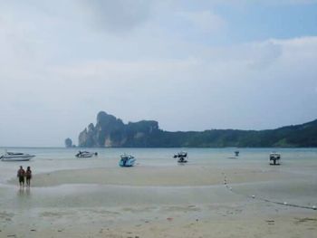 Scenic view of sea against cloudy sky