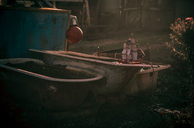 Tilt shift image of ship moored in water