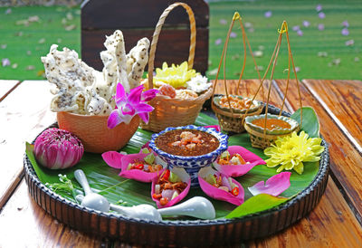 Close-up of various flowers on table