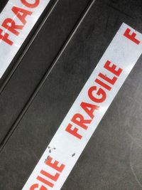 High angle view of fragile tape