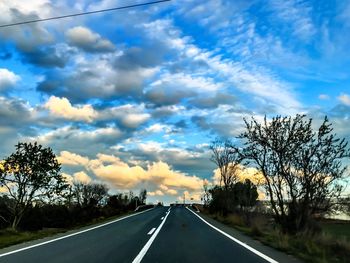 Empty road at sunset