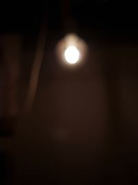 Close-up of illuminated light bulb