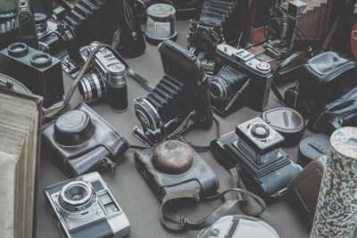 High angle view of vintage camera on table