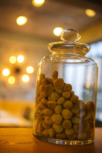 Close-up of drink in glass jar on table