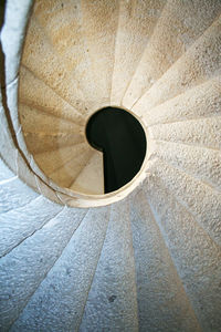 Directly below shot of spiral staircase