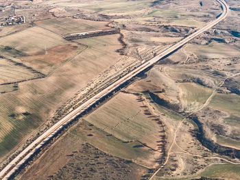 High angle view of road amidst field