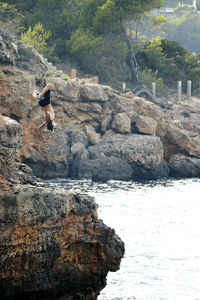 Man standing on rock formation