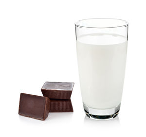 Close-up of drink against white background
