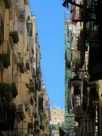 Low angle view of buildings against clear sky