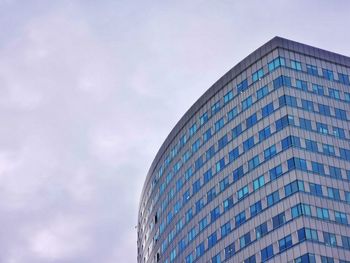 Low angle view of skyscraper against sky