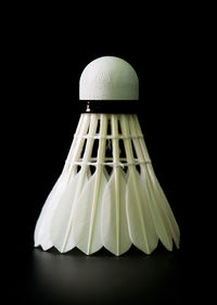 Close-up of electric lamp against black background