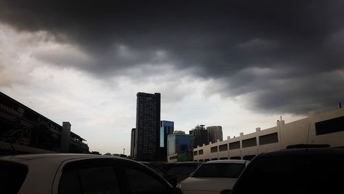Low angle view of modern city against sky
