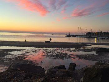Scenic view of sea against sky at sunset
