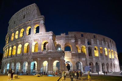 Group of people in front of historical building